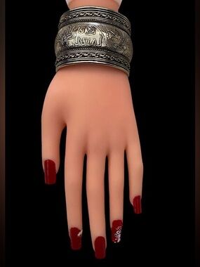 Made in India elephant engraved silvertone wide cuff bracelet